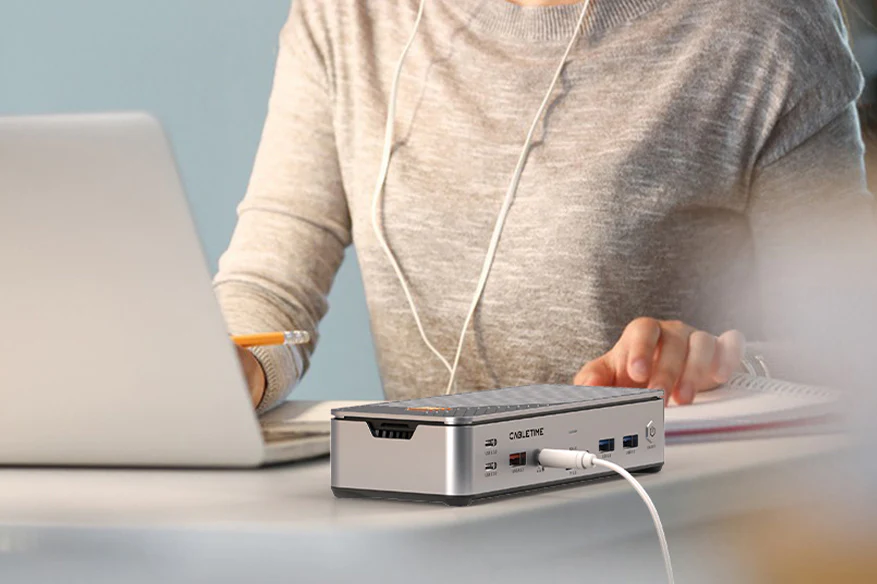 3.5mm Mic/Audio Enhance your audio experience with our universal USB C docking station's 3.5mm Mic/Audio port. Whether joining a conference call, listening to music, or recording a voice note, this port ensures clear and crisp sound quality. It's a simple addition that makes a big difference, allowing you to easily connect headphones, microphones, or speakers.
